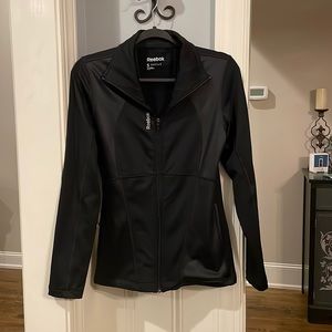 Like new Reebok ladies track jacket. Size small.